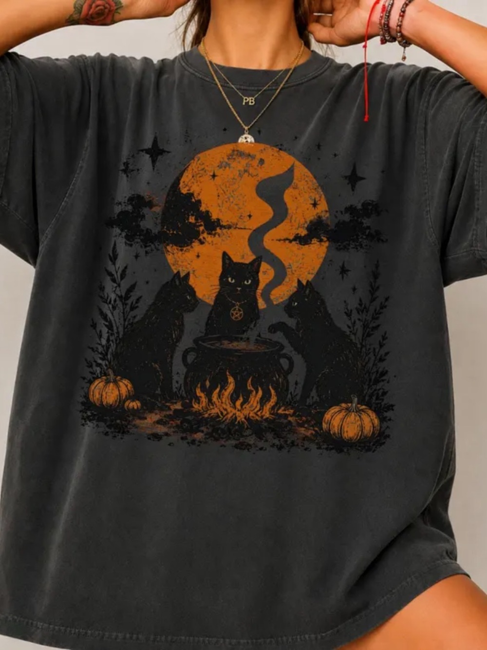 Pepper Comfort Tee with Orange Halloween Cat Cauldron Graphic
